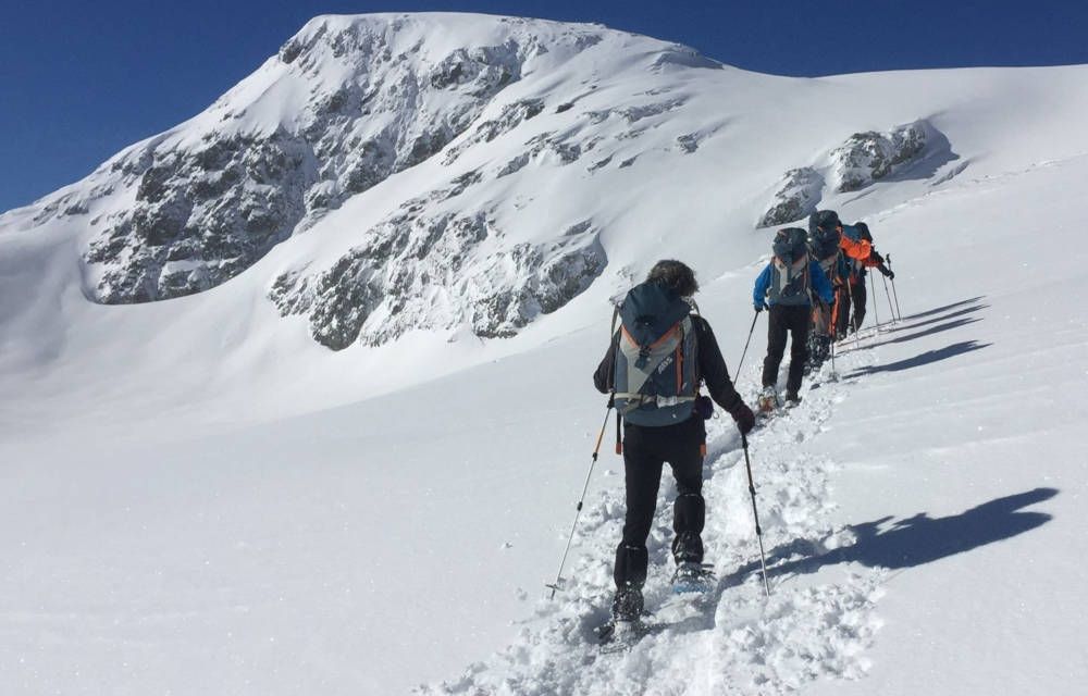 hiking on snow shoes in Switzerland