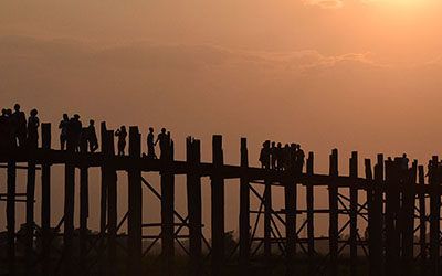 Walking over the U-Bein Bridge