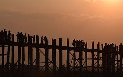 Walking over the U-Bein Bridge