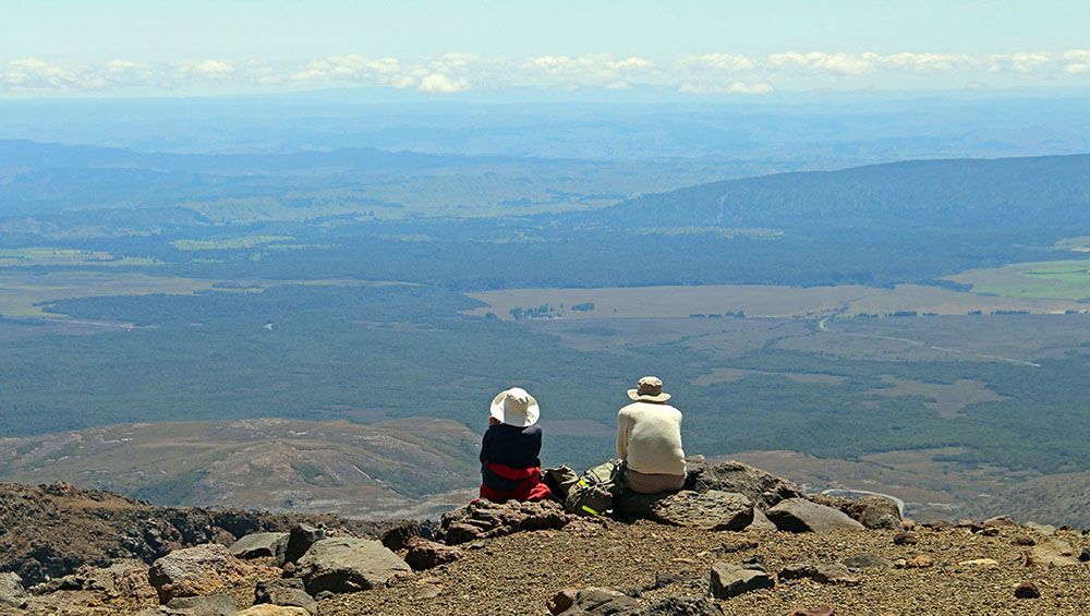 Two hikers in Tongariro National Park, New Zealand